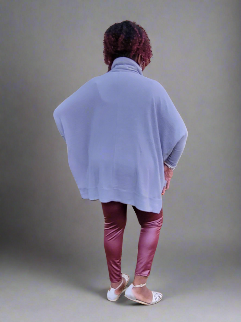 Rear view of oversized sweater; 82% polyester; 15% cotton; 3% spandex