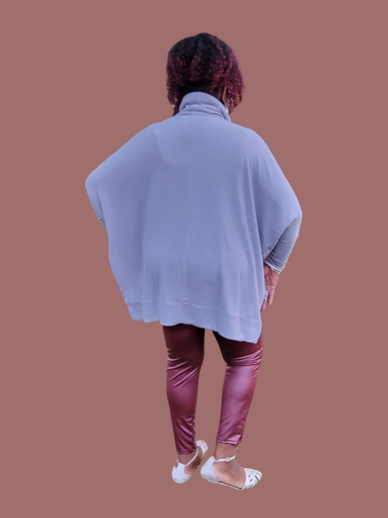 Rear view of oversized sweater; 82% polyester; 15% cotton; 3% spandex