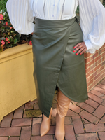 Front of Wrap front faux leather skirt, tie belt at waist