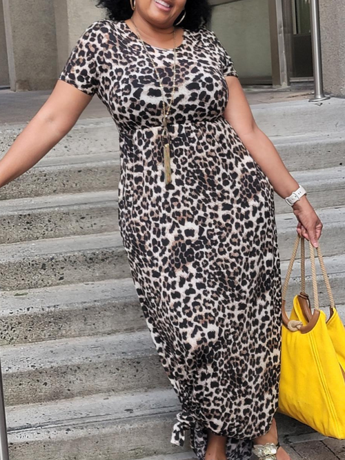  Front view of Short sleeve round neck leopard print maxi dress with side pockets. Background is cream color with brown and black leopard print; 95%POLYESTER 5%SPANDEX